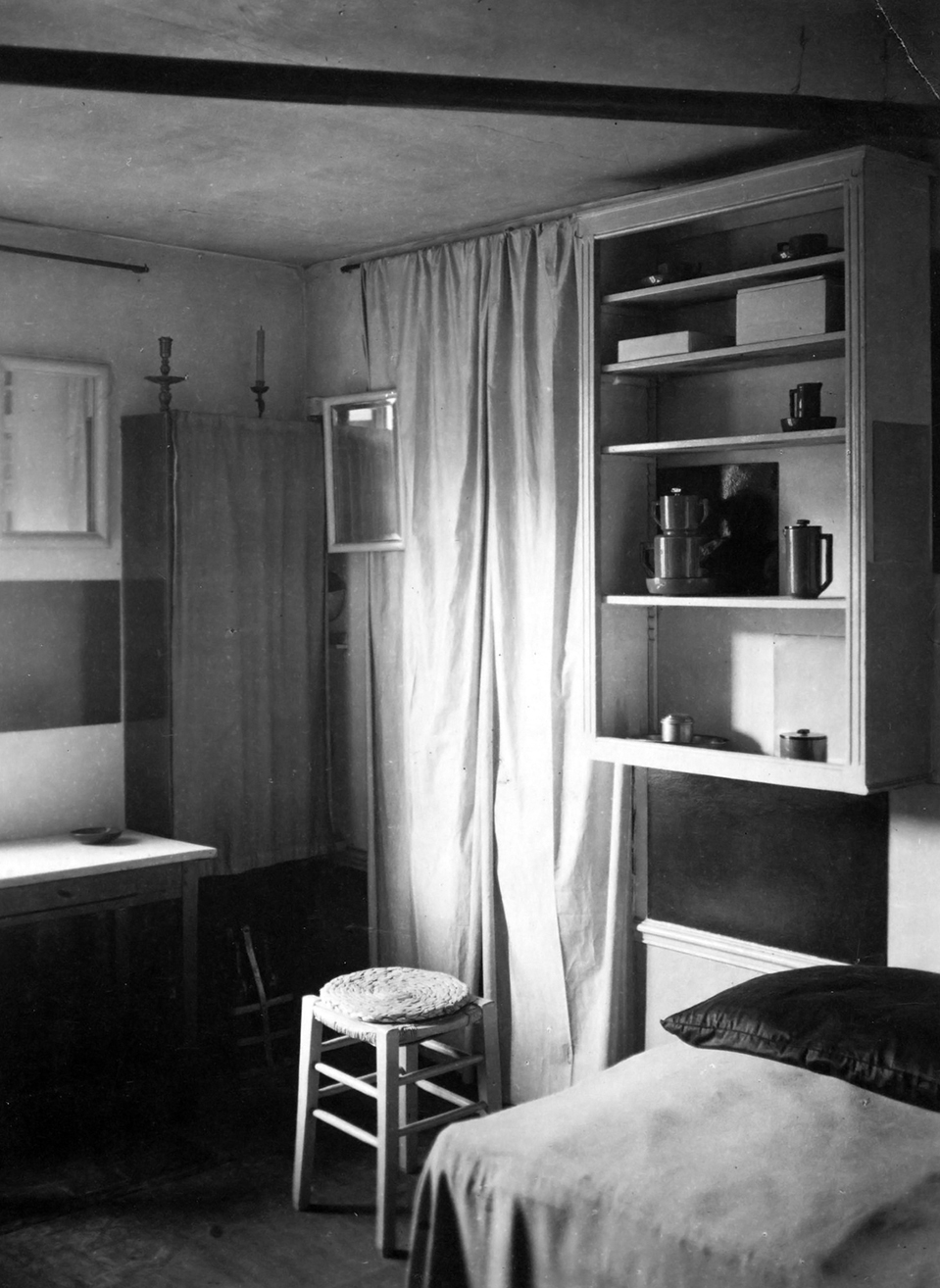 andrc3a9-kertc3a9sz-a-corner-of-mondrian_s-studio-with-bed-stool-curtain-and-mirrors-1926
