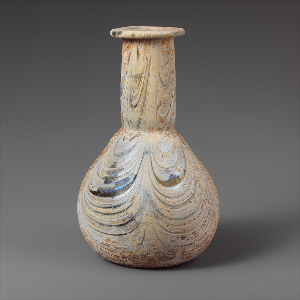 http://www.metmuseum.org/art/collection/search/253548 Roman, Glass perfume bottle, early to mid-1st century A.D., Glass, H.: 6 3/16 in. (15.7 cm). The Metropolitan Museum of Art, New York. Bequest of George D. Pratt, 1935 (37.128.7)