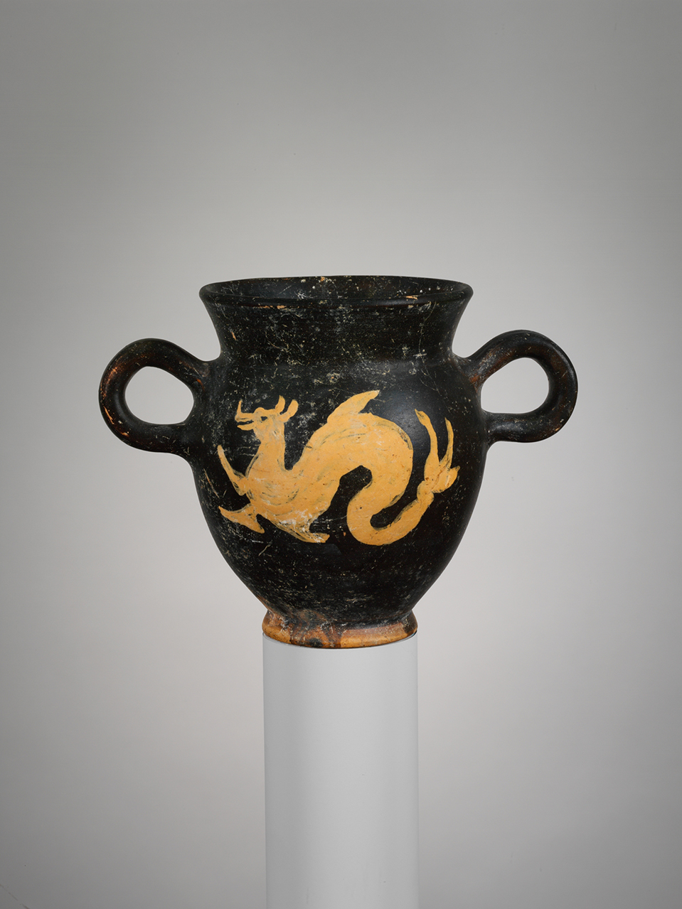 http://www.metmuseum.org/art/collection/search/255162 Etruscan, Terracotta kantharos (drinking cup), late 4th century B.C., Terracotta, Overall: 5 1/16 x 6 7/8in. (12.9 x 17.4cm); diameter of lip  3 7/8in. (9.9cm); diameter of body  4 5/16in. (10.9cm); diameter of foot  2 1/4in. (5.8cm). The Metropolitan Museum of Art, New York. Rogers Fund, 1964 (64.11.6)